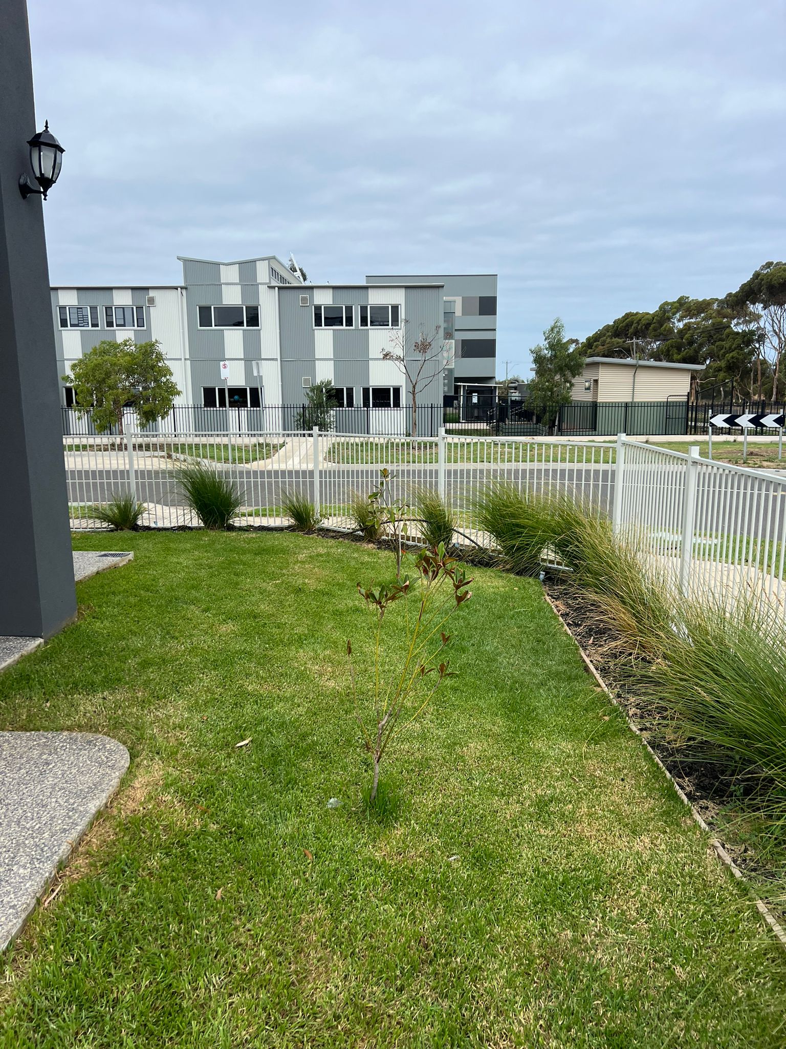 New white tubular aluminium fence, Point Cook